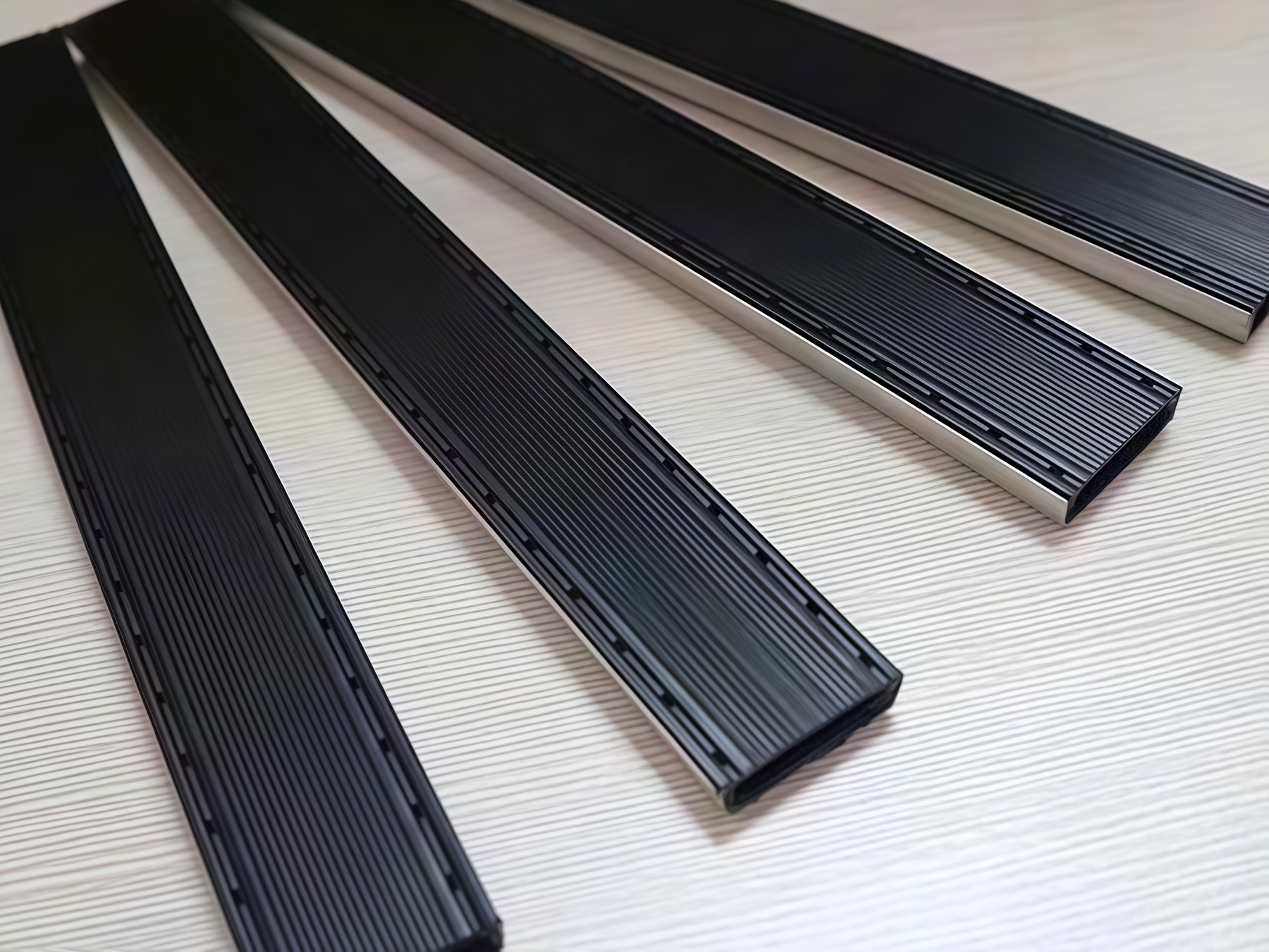 Glass fiber reinforced PP warm edge spacer for refrigerated display cases